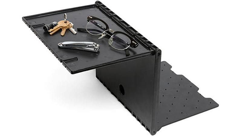 Illustration for article titled A Flatpack Portable Night Stand Is a Brilliant Travel Accessory